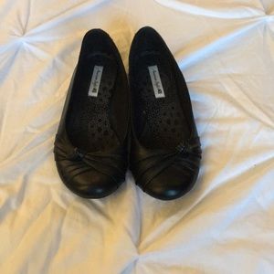 Black dress shoes. Flats.